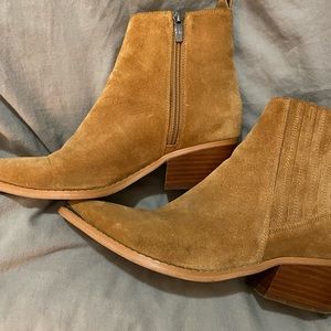 MARC FISHER pointed booties with a silver metallic cuff at the toe.